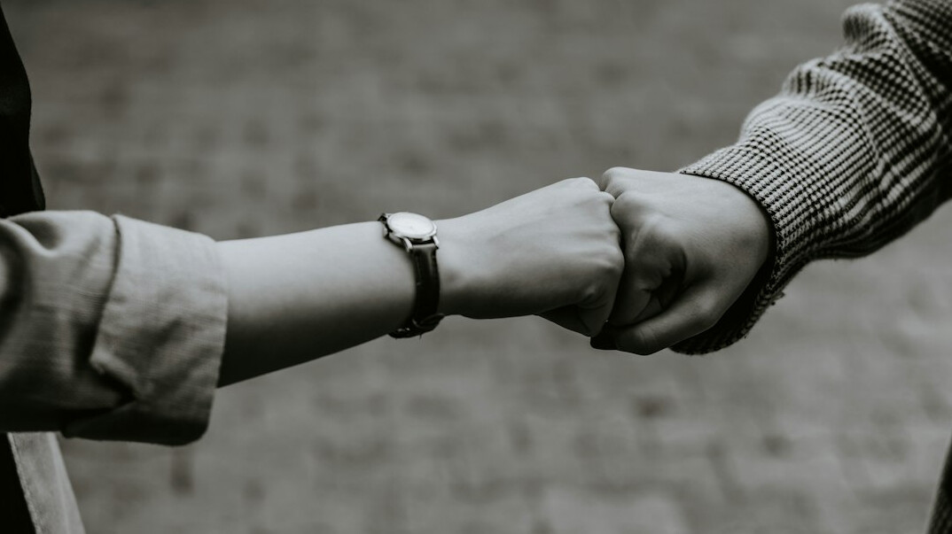 peaceful handshake after talk