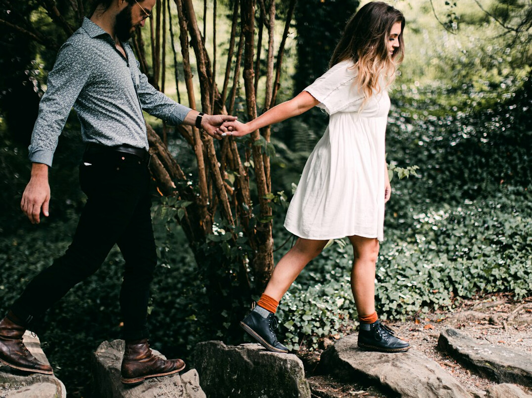 diverse couple walking in nature